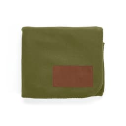 A green blanket made from rPET fabric, featuring a customisable brown patch.
