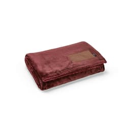 A maroon blanket made from rPET with a customisable patch. It features a soft, plush texture.
