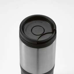 A drink bottle with a stainless steel body and a black leakproof lid. It features a logo on the side.