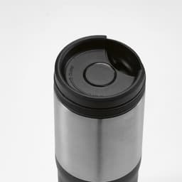 A drink bottle with a stainless steel body, black lid, and a logo, designed for travel with a leakproof feature.