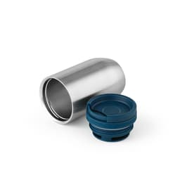 A travel cup in stainless steel with a dark blue, leakproof lid. The lid is separate from the cup in the image.