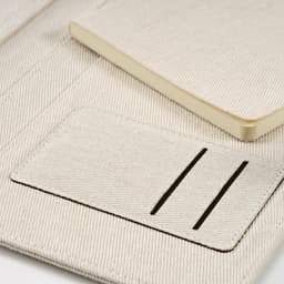 An off-white A4 folder with a notepad and elastic closure, featuring pockets and a branded logo.