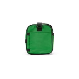 A green gym bag with reflective strips, featuring a zipper closure and exterior pockets. It has a logo on the side.