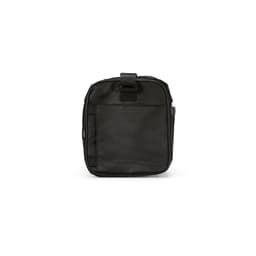 A black gym bag made of ripstop material, featuring reflective strips and a branding logo.