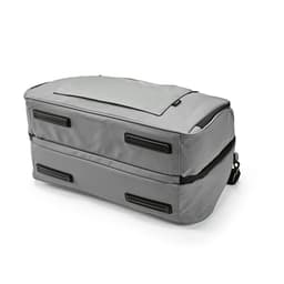 A grey gym bag with waterproof zippers and a top pocket, featuring a compact, rectangular design. It has a logo.