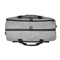 A grey gym bag with waterproof zippers and dual compartments, featuring black handles and details.