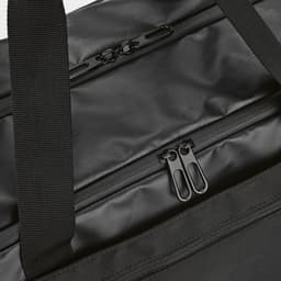 A black gym bag with waterproof zippers and sturdy black straps. The material appears smooth and durable.