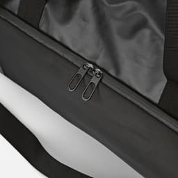 A black gym bag featuring waterproof zippers and a sturdy handle. The bag has a sleek, minimalist design.