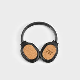 A pair of black headphones with cork ear cups and a simple design. Features a logo on the ear cups.
