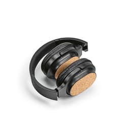 Black headphones with cork ear cups, featuring a foldable design for easy storage. Includes a visible logo.