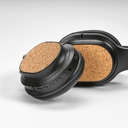 Headphones with black ear cups featuring cork accents, showcasing a sleek design and adjustable features.