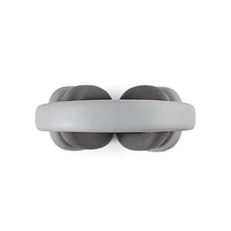 A pair of grey headphones with cushioned ear cups, featuring an adjustable headband and a simple design.