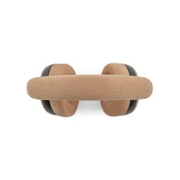 A pair of tan and black headphones with plush ear cushions and a soft headband, viewed from above.