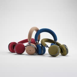 A collection of stylish headphones in various colours: red, blue, green, and beige, featuring cushions and controls.