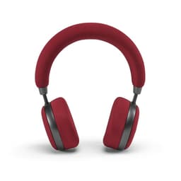 A pair of red headphones with a soft fabric finish and black accents, featuring over-ear cups and a padded headband.