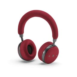 A pair of red headphones with a fabric finish, featuring an adjustable headband and integrated controls.