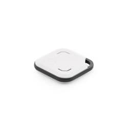 A white and black VibeTag tracker with a compact, square design, featuring a loop for attachment and a logo.