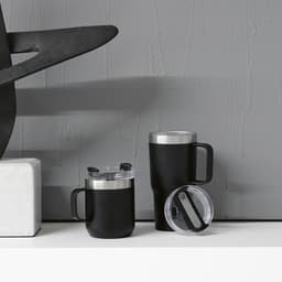 A drink bottle featuring a double wall and rotating lid, presented in black with stainless steel accents. It includes a logo.