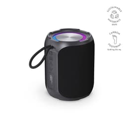 A compact, cylindrical black speaker with a metallic top and a cord for portability. It features a logo and colourful lights.