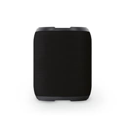 A black portable speaker with a textured surface, featuring IPX6 protection and a compact square design.