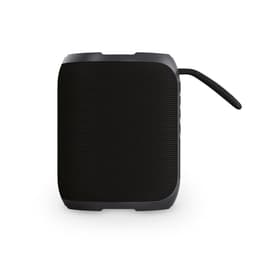 A black portable speaker with a textured surface and a carrying strap, featuring side control buttons.