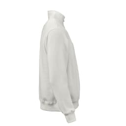 A white 1/4 zip sweatshirt made from organic cotton, rCotton, and rPET, featuring a logo.
