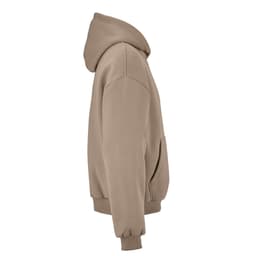 An oversized hooded sweatshirt in a soft beige colour, featuring a pouch pocket and a simple design.