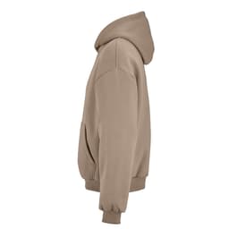 An oversized hooded sweatshirt in a light tan colour with a pouch pocket and ribbed cuffs. It features a logo.