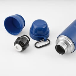 A drink bottle in blue with a silver opening, featuring two cups and a black carabiner.