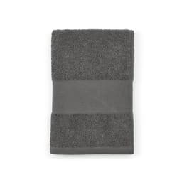 A grey towel made of cotton with a textured design and a smooth band. It features branding.