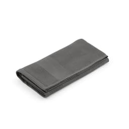 A grey towel made of cotton, featuring a textured design, folded neatly. The product has a logo.