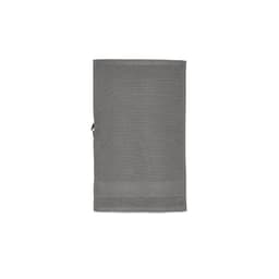 A grey cotton towel, featuring a textured design, with a loop for hanging. It has a logo on the corner.