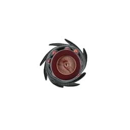 A black and maroon stylised decoration with circular and spiral elements, featuring spherical beads and a textured centre.