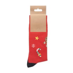 A pair of red socks featuring festive designs, including a gingerbread man, candy cane, and snowflakes. The socks are displayed with a paper tag.