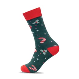 A green sock featuring red candy canes, holly leaves, and a red cuff. The design includes white snowflakes and colourful dots.