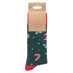A pair of green socks featuring candy canes, holly, and snowflakes, with red accents and a display tag.
