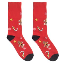 A pair of red socks featuring gingerbread men, candy canes, and snowflakes on a festive background.