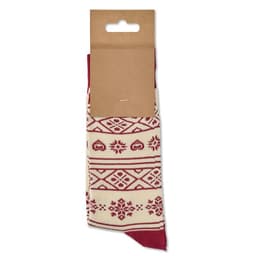 A pair of patterned socks in cream and red, featuring geometric designs, presented on a cardboard backing.