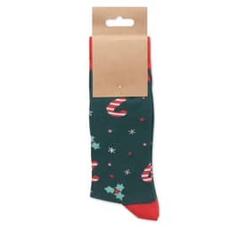 A pair of green Christmas-themed socks featuring candy canes and holly, with a red cuff and packaged on a cardboard hanger.