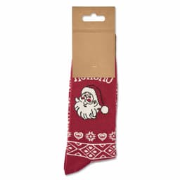 A Christmas-themed sock in red featuring a Santa Claus design, displayed with a cardboard tag.