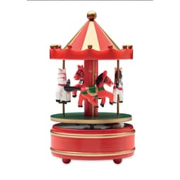 A decorative carousel featuring red and white horses, under a red and gold striped canopy. It has a round base.