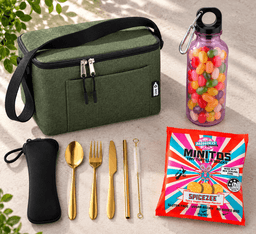 A green lunch bag, gold cutlery set, a drink bottle with colourful beads, and a snack packet.