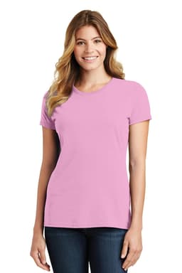 A woman wearing a pink short-sleeve t-shirt, standing and smiling. The shirt features a logo.
