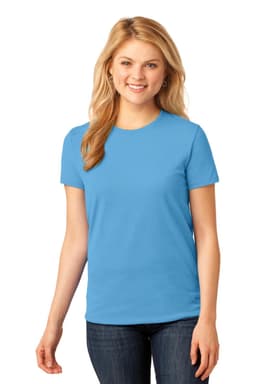 A woman wearing a light blue ladies' t-shirt, featuring a round neckline and short sleeves. The shirt has a logo.
