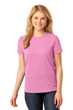 A woman is wearing a pink t-shirt with short sleeves. The shirt has a logo on it and is styled with jeans.
