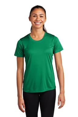 A woman wears a green Sport-Tek Ladies PosiCharge Competitor Tee, smiling while standing against a white background.