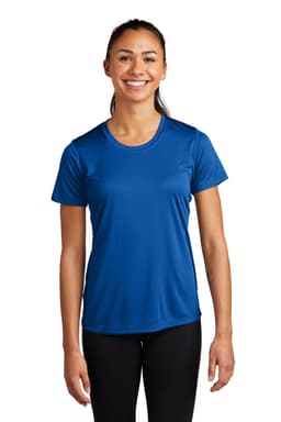A woman wearing a blue Sport-Tek Ladies PosiCharge Competitor Tee, smiling while standing against a white background.