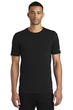 A black Nike Dri-FIT cotton/polyester t-shirt displayed on a model, featuring short sleeves and a logo.