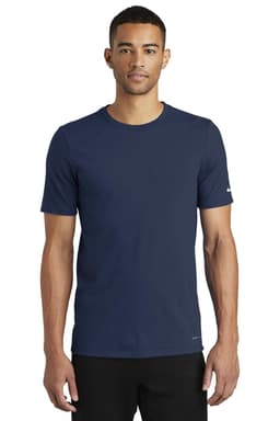 A navy blue Nike Dri-FIT Cotton/Poly T-shirt with short sleeves, featuring a logo on one sleeve.