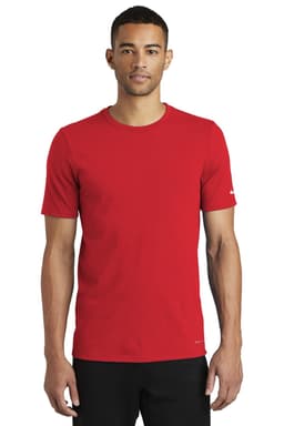 A red Nike Dri-FIT Cotton/Poly Tee on a male model, featuring a logo on the sleeve.